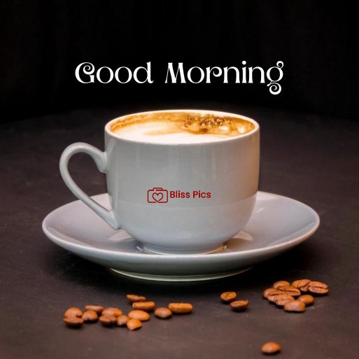 simple white coffee cup with saucer and some coffee beans on table simple white coffee cup with saucer and some coffee beans on table - good morning images with coffee